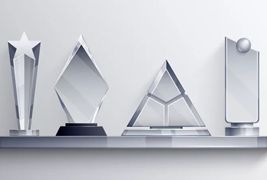 四个不同形状的透明水晶奖杯矢量素材
